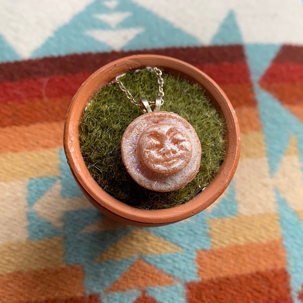 Sweet baby moon face necklace. 18”sterling silver chain, resin face